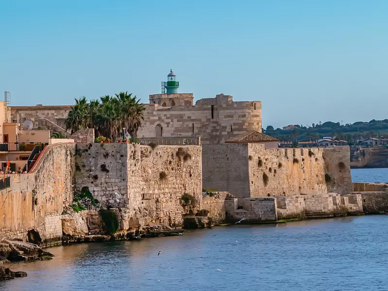 Maniace Castle (Castello Maniace, 1232 -1240) - ancient magnificent citadel and castle at the easternmost point of the Ortygia island. Syracuse, Sicily, Italy., License Type: media, Download Time: 2025-10-09T20:04:36.000Z, User: LP_YKhanna, Editorial: false, purchase_order: 65050 - Digital Destinations and Articles, job: Lonely Planet, client: App Content, other: Yuvraj Khanna