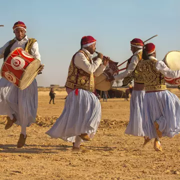 Musicians perform at the Festival of the Sahara in Douz, Tunisia. Podolnaya Elena/Shutterstock