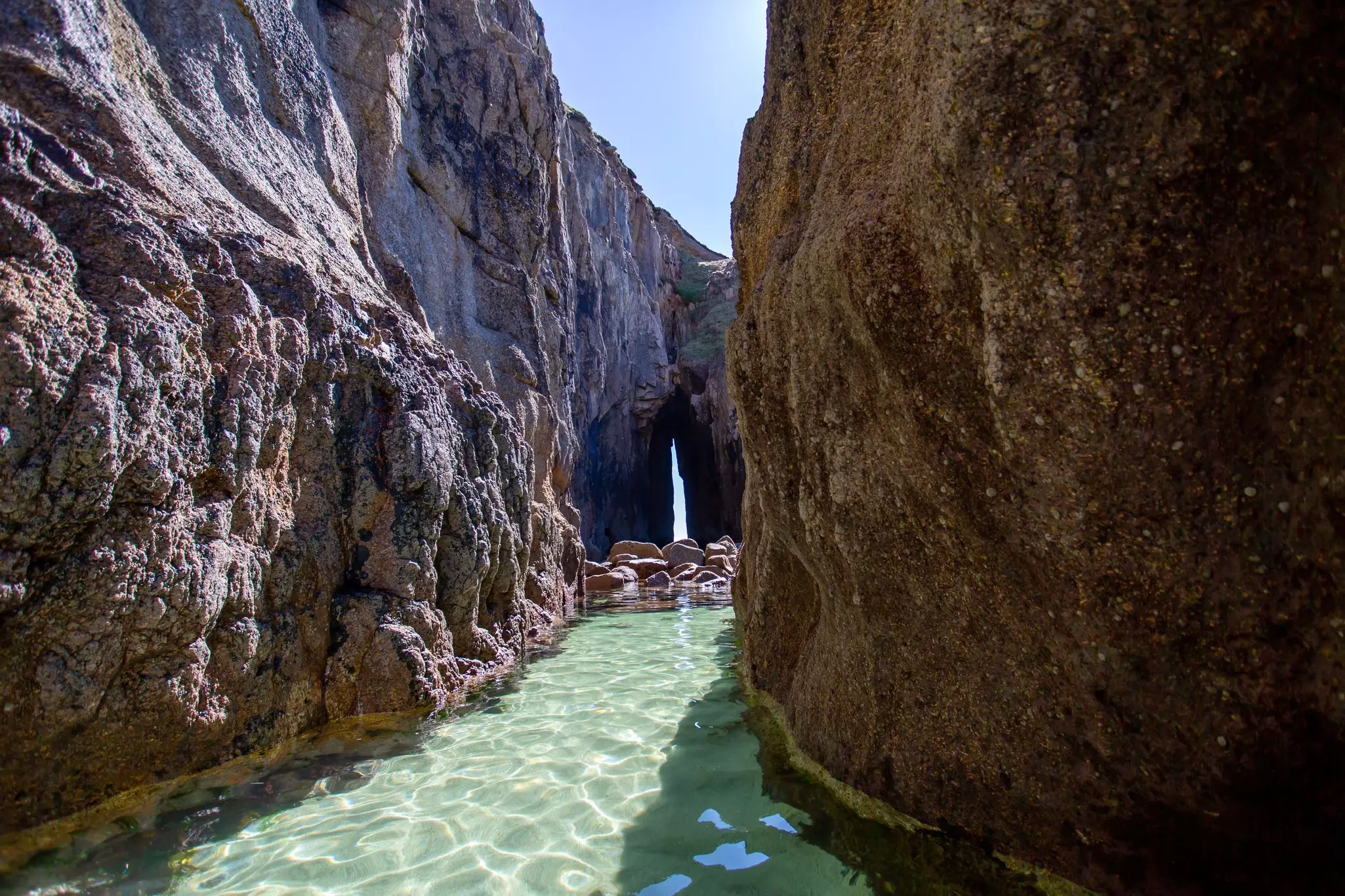 The Song of the Sea cave at Nanjizal Beach in Cornwall, England.