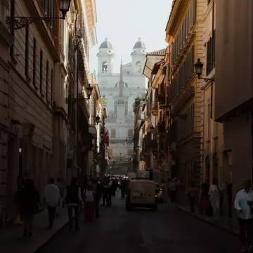 Rome, Italy - 6th october 2023: Via Condotti with the stairs of Piazza di Spagna on the background, License Type: media, Download Time: 2025-02-10T19:20:52.000Z, User: Ppeterson948, Editorial: true, purchase_order: 56530 - Guidebooks, job: Global Publishing WIP , client: Global Publishing WIP , other: Pia Peterson Haggarty