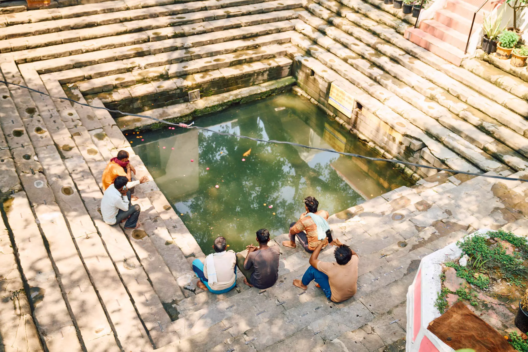 RISHIKESH, INDIA. MAY 2025
Water body at a temple near Triveni Ghat, Rishikesh
