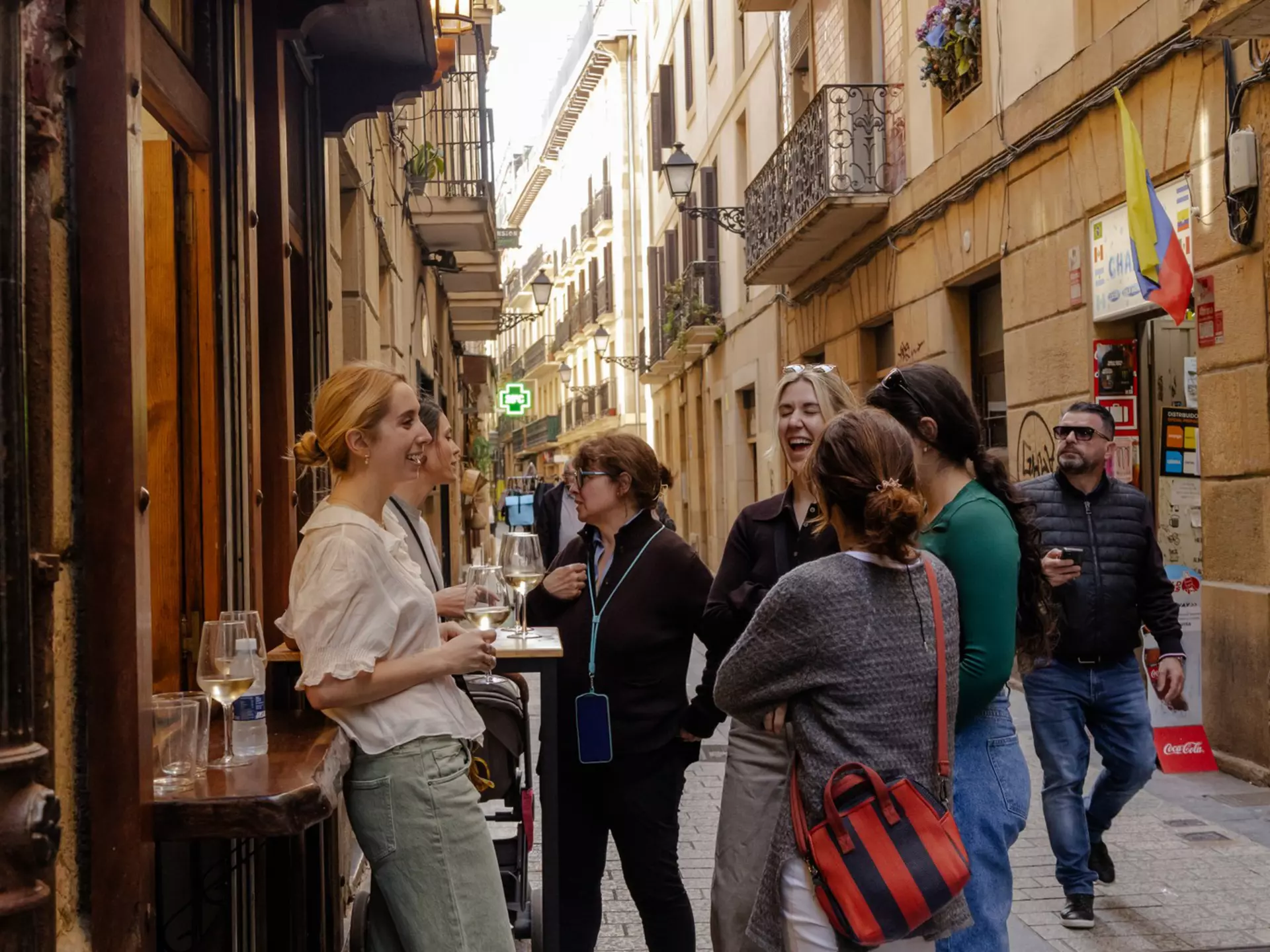 People enjoying a pinxtos tour in San Sebastián, Spain