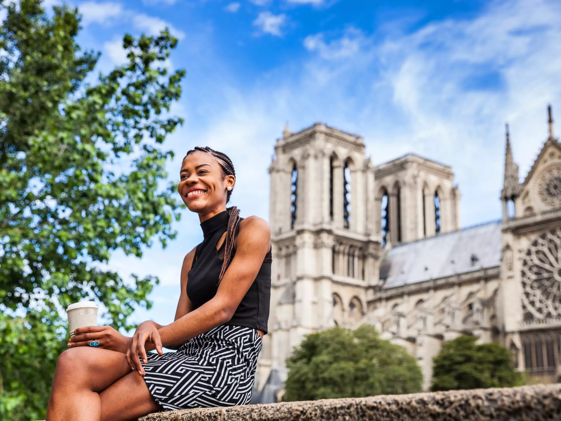 Young black woman walking in Paris near Notre Dame cathedral.
579165728
Beautiful, African Descent, City Break, Capital Cities, Real People, Candid, Travel, Coffee Break, People Traveling, Tourism, Coffee Cup, One Woman Only, Young Women, Women, Females, Weekend Activities, City Life, Youth Culture, Downtown District, Cute, 20-29 Years, Young Adult, Adult, Smiling, Sitting, Waiting, One Person, Cool, Carefree, Happiness, Modern, Cultures, Famous Place, Lifestyles, Outdoors, Cheerful, People, Notre Dame De Paris, Paris - France, France, Europe, Summer, Springtime, Cathedral, Mug
CLEARED FOR DIGITAL USE ONLY -