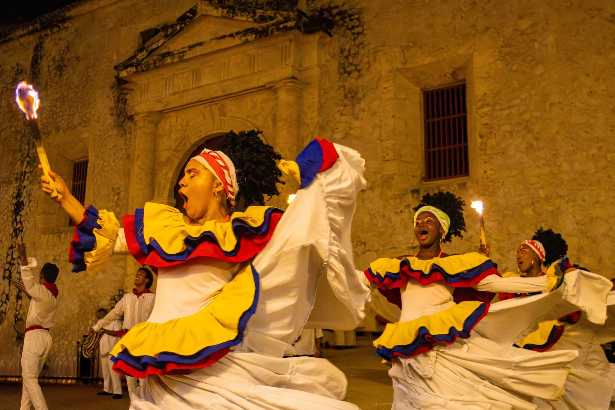 Cartagena, Colombia - August 20 2025 - A vibrant cultural dance festival showcases traditional costumes and performances under the night sky.