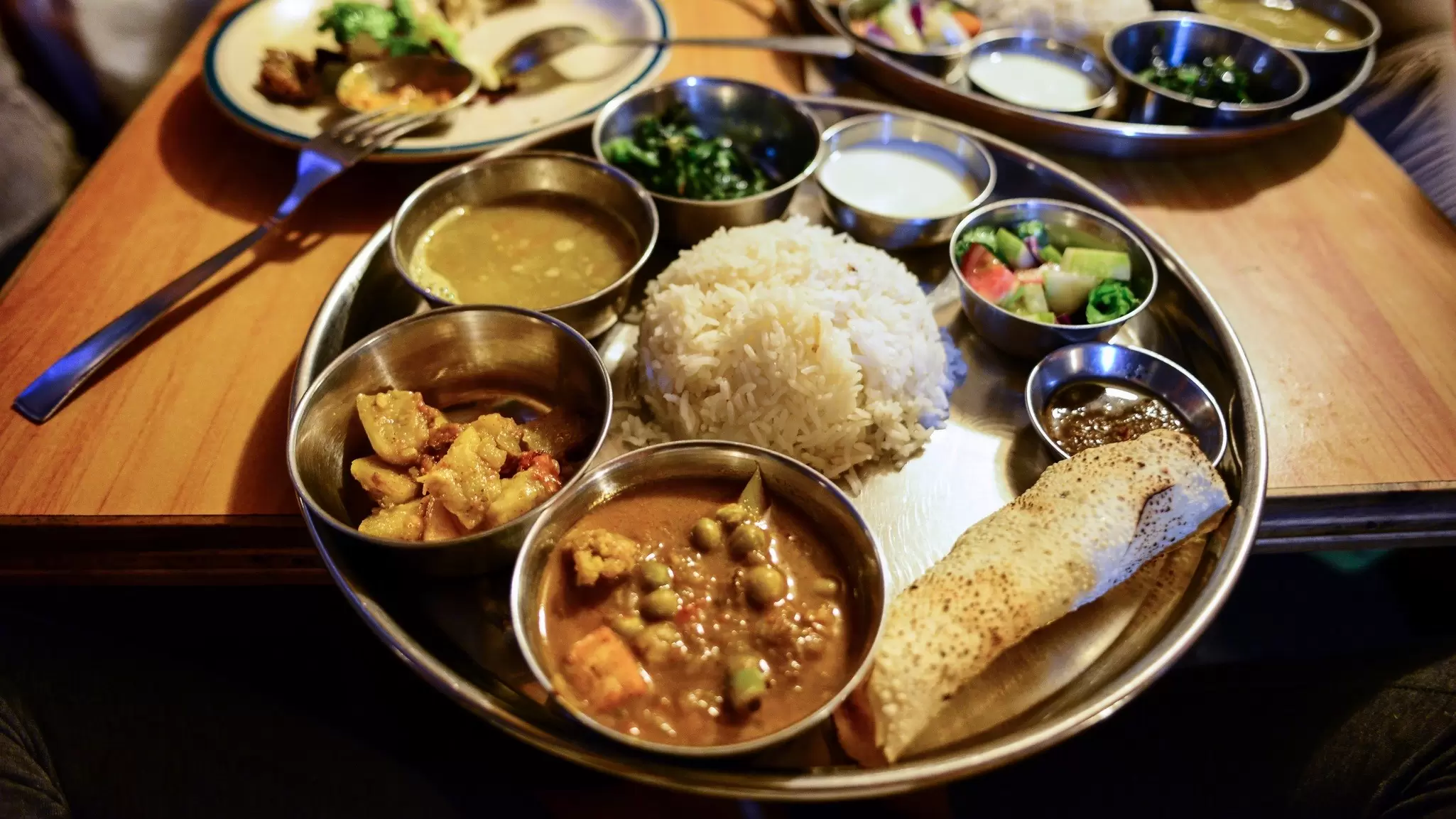 Dal bhat (rice and lentils) is a staple of Nepali cuisine. Maya Karkalicheva/Getty Images