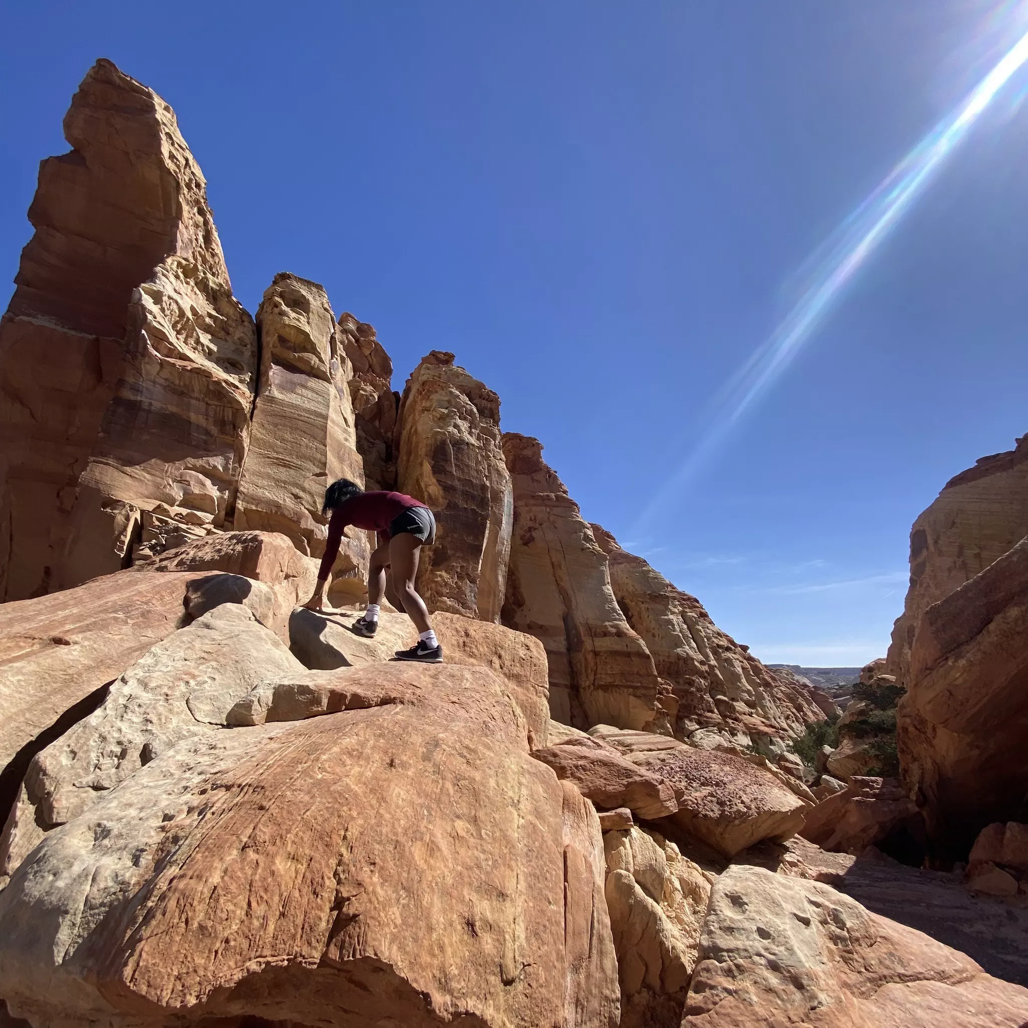 I was comfortable wearing a thermal long-sleeve top and shorts along Capitol Reef’s Cohab Canyon Trail, but I needed extra layers as soon as the sun went down © Deepa Lakshmin / Lonely Planet
