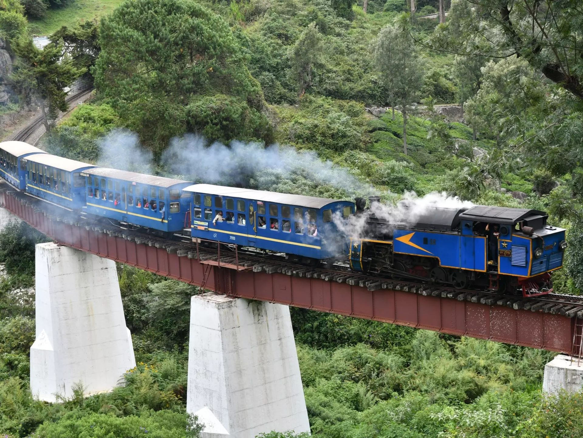 The Nilgiri Mountain Railway offers sweeping views of the Western Ghats. Jeeshan2920/Shutterstock