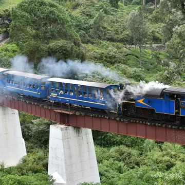 The Nilgiri Mountain Railway offers sweeping views of the Western Ghats. Jeeshan2920/Shutterstock