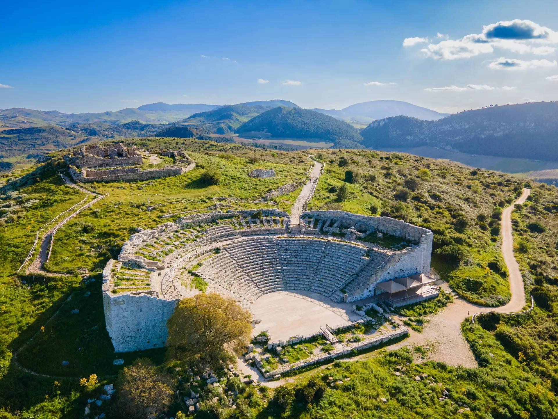 The Greek Theater of Segesta or Teatro di Segesta aerial panoramic view. It is located near the Calatafimi Segesta town in the Trapani Province of Sicily.