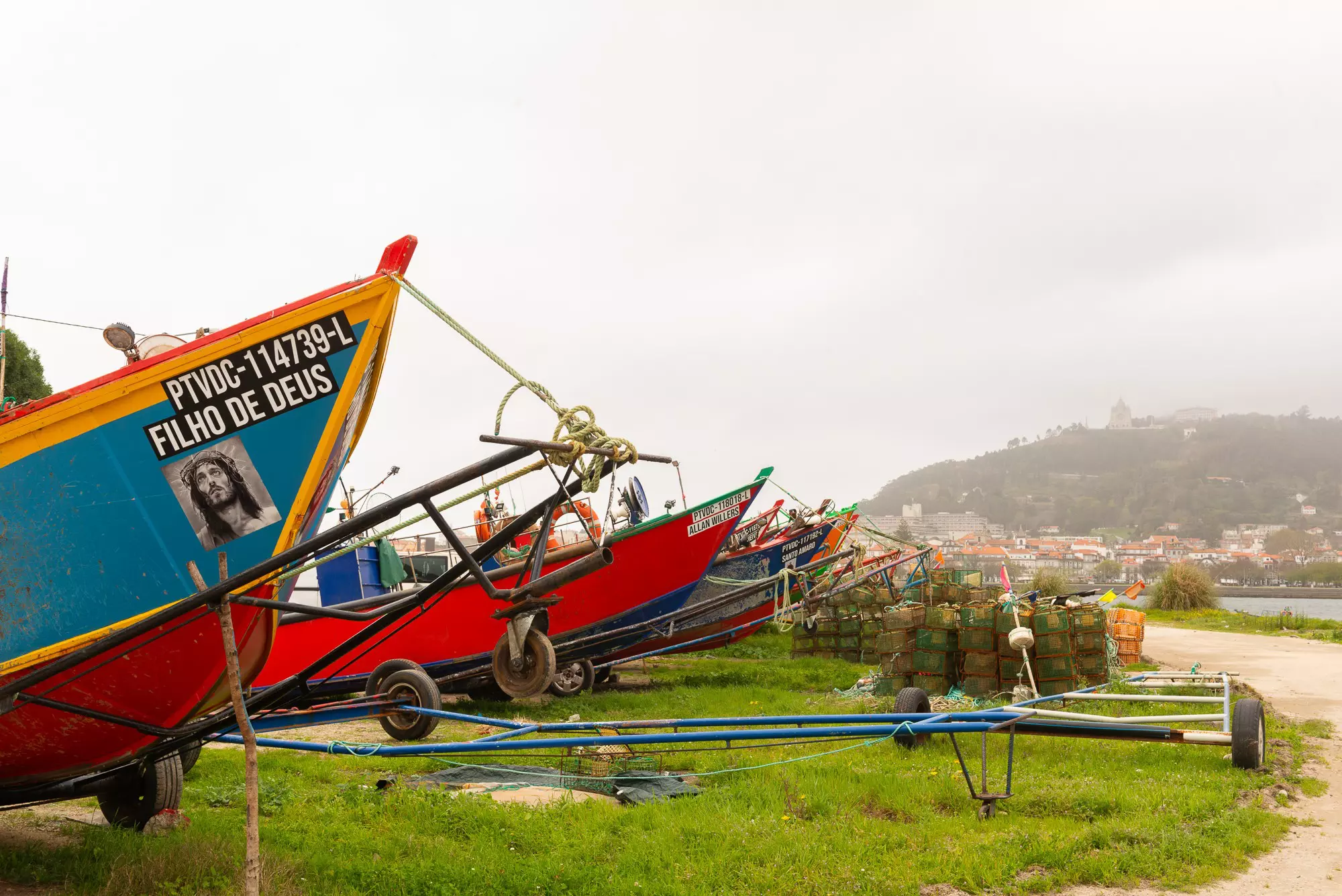 Fishing boats on shore opposite Viana do Castelo © Austin Bush