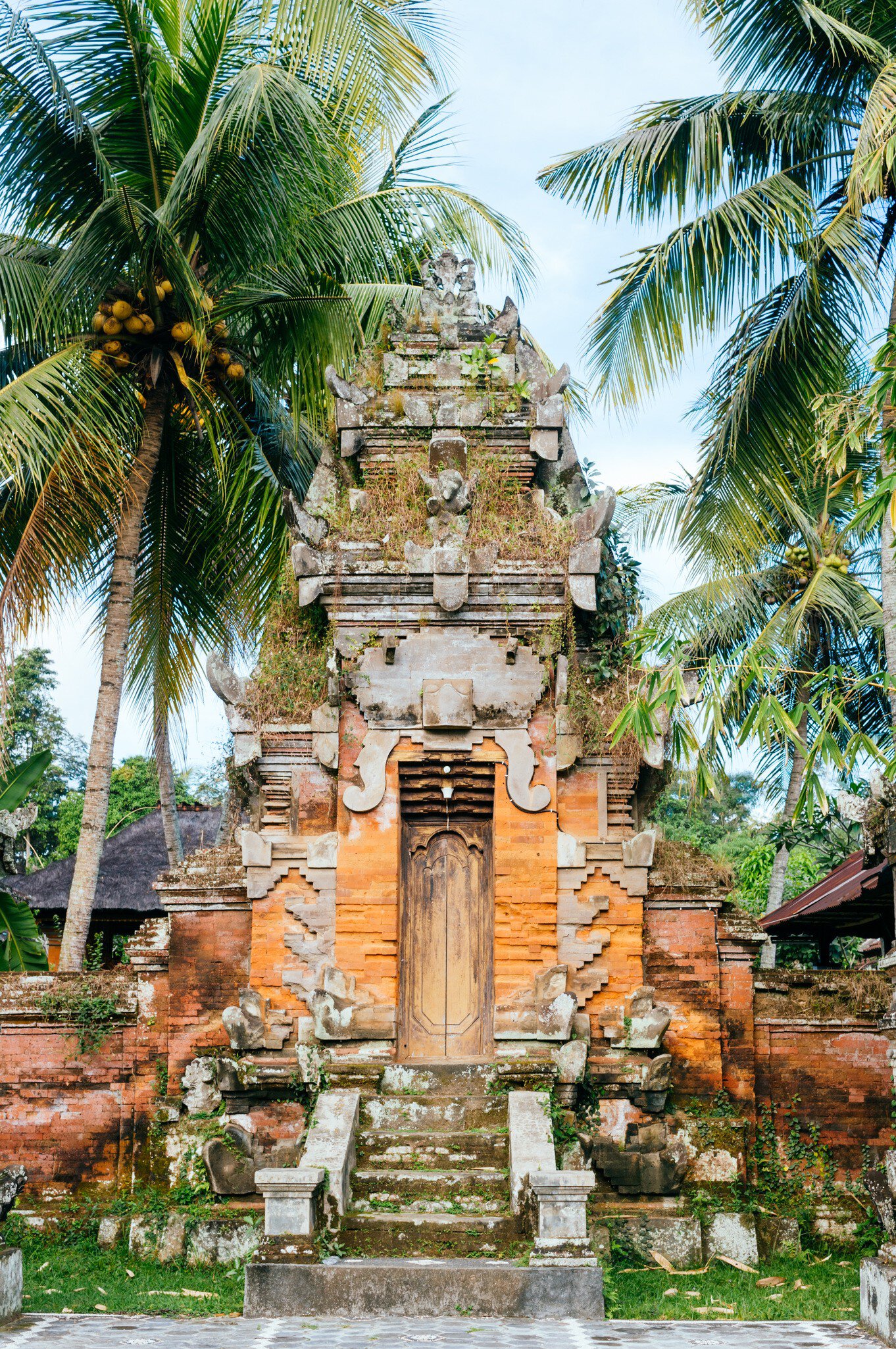 Pura Desa Temple in Ubud.
407915260
entry, stone, gate, craig, travel, statue, history, indonesian, village, door, asia, faith, tourist, historic, architecture, style, site, island, doorway, destination, historical, cultural, culture, location, indonesia, vertical, building, balinese, belief, lovell, asiatic, bali, temple, courtyard, hindu, religion, eastern, munggi, desa, pura, ubud, meru