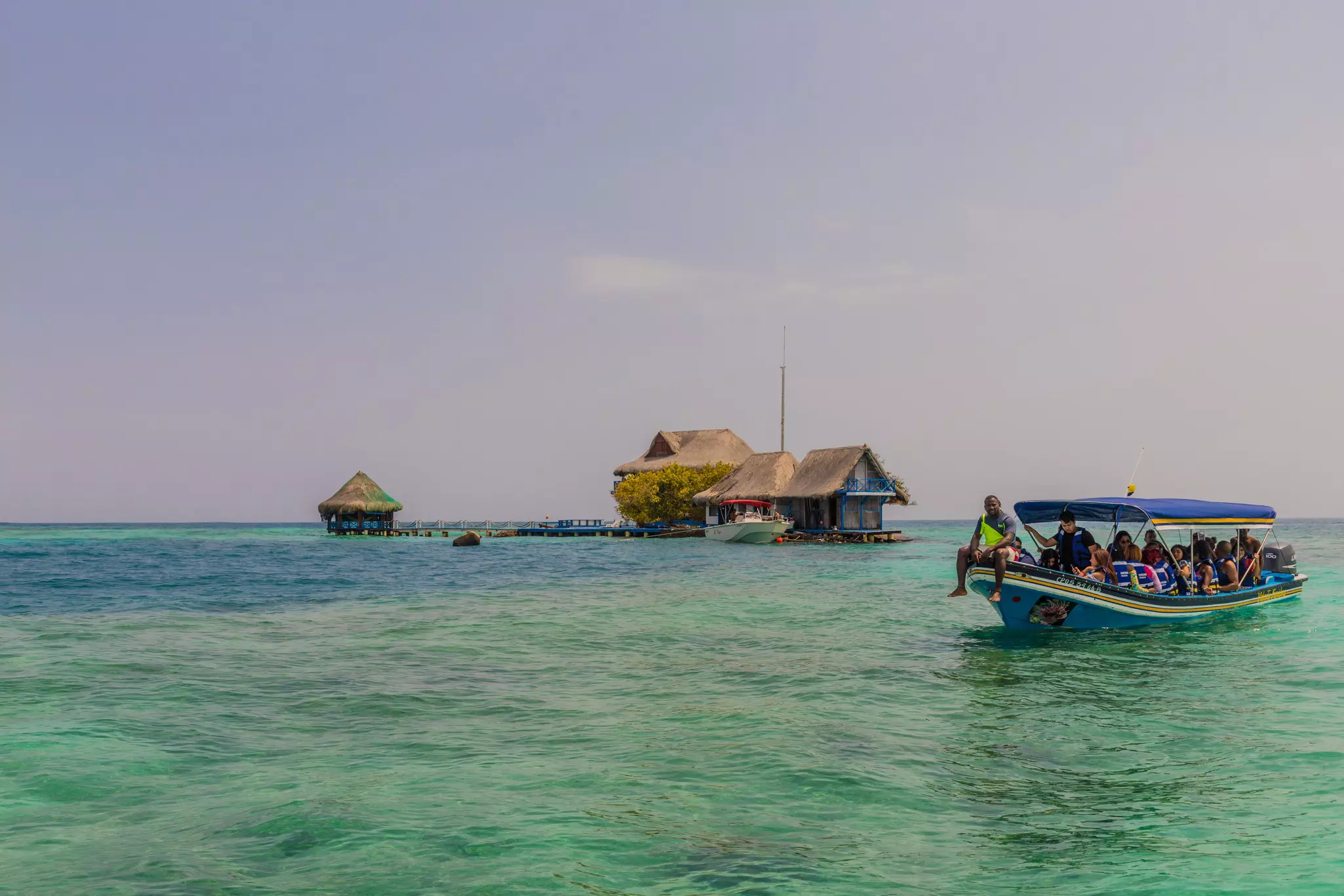 A view of a boat loaded with passendon the rosario Islands near Cartagena, Colombia.