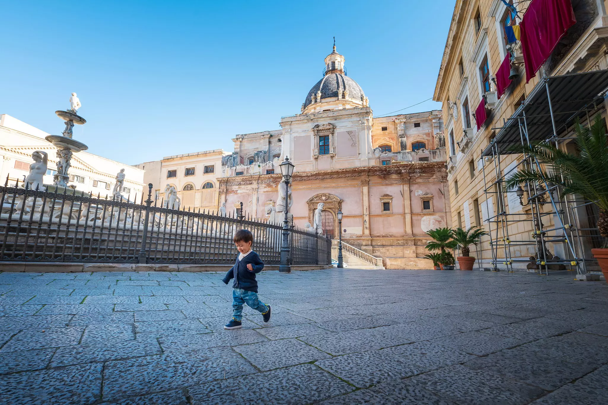 Babies, toddlers and children are welcome everywhere in Sicily, but don't expect much in the way of changing facilities © Stefan Tomic / Getty Images