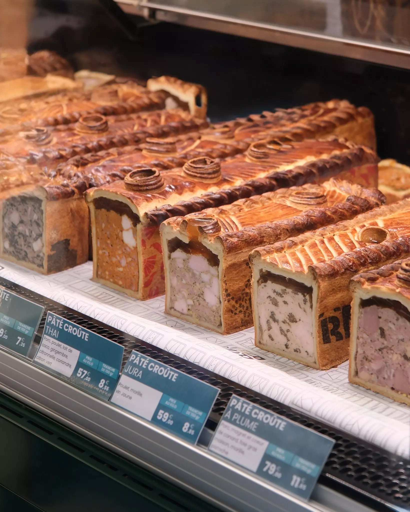 Meat wrapped in pastry served at a counter