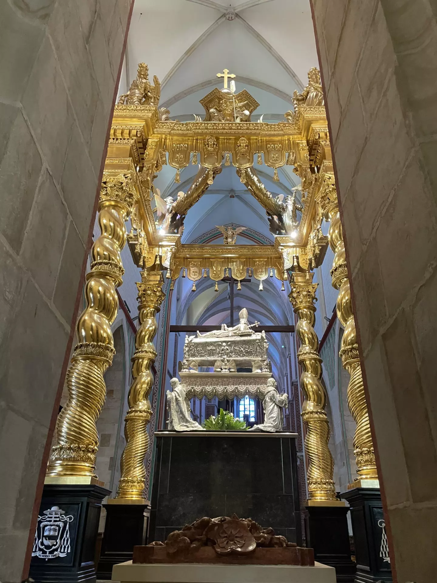 An ornate gold and silver tomb