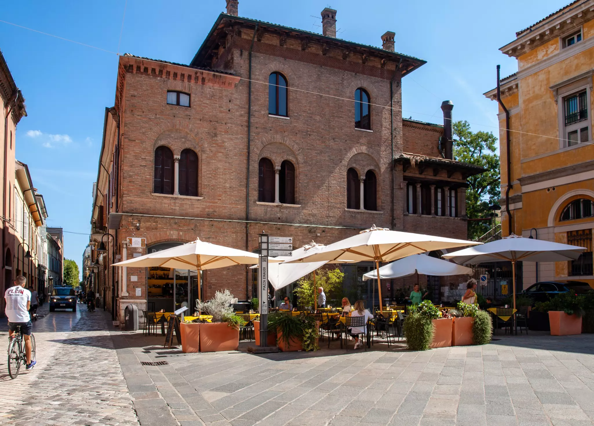 A restaurant terrace in an ancient city square