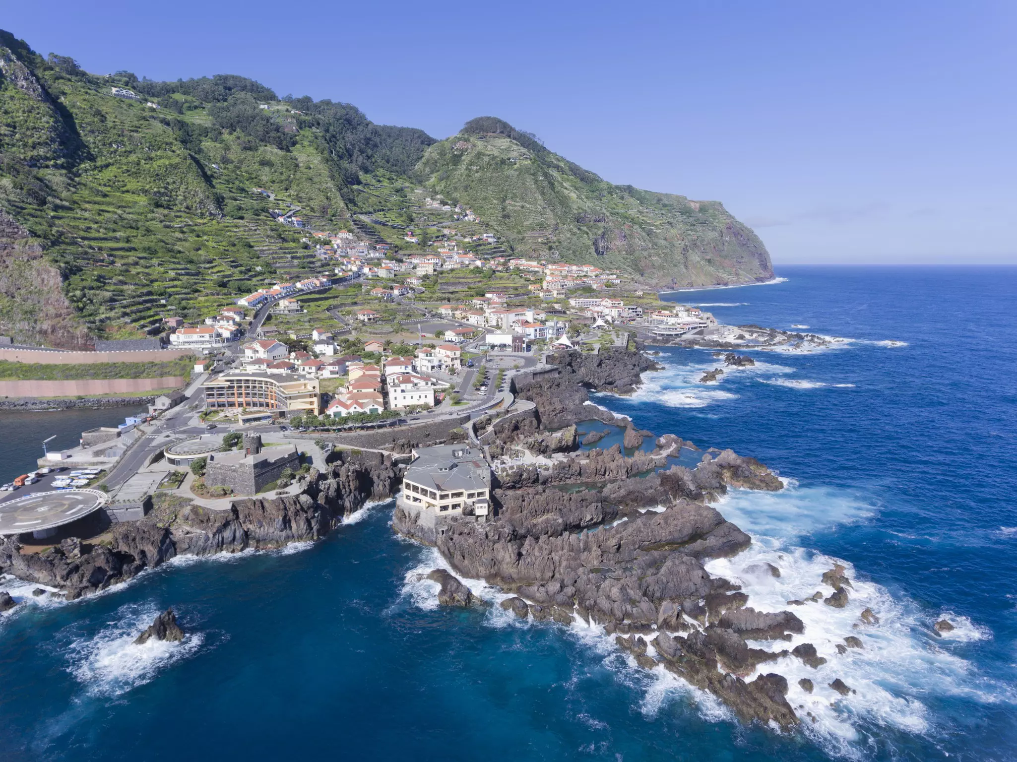 Aerial view of Porto Moniz seaside tourist town, Madeira island, Portugal .