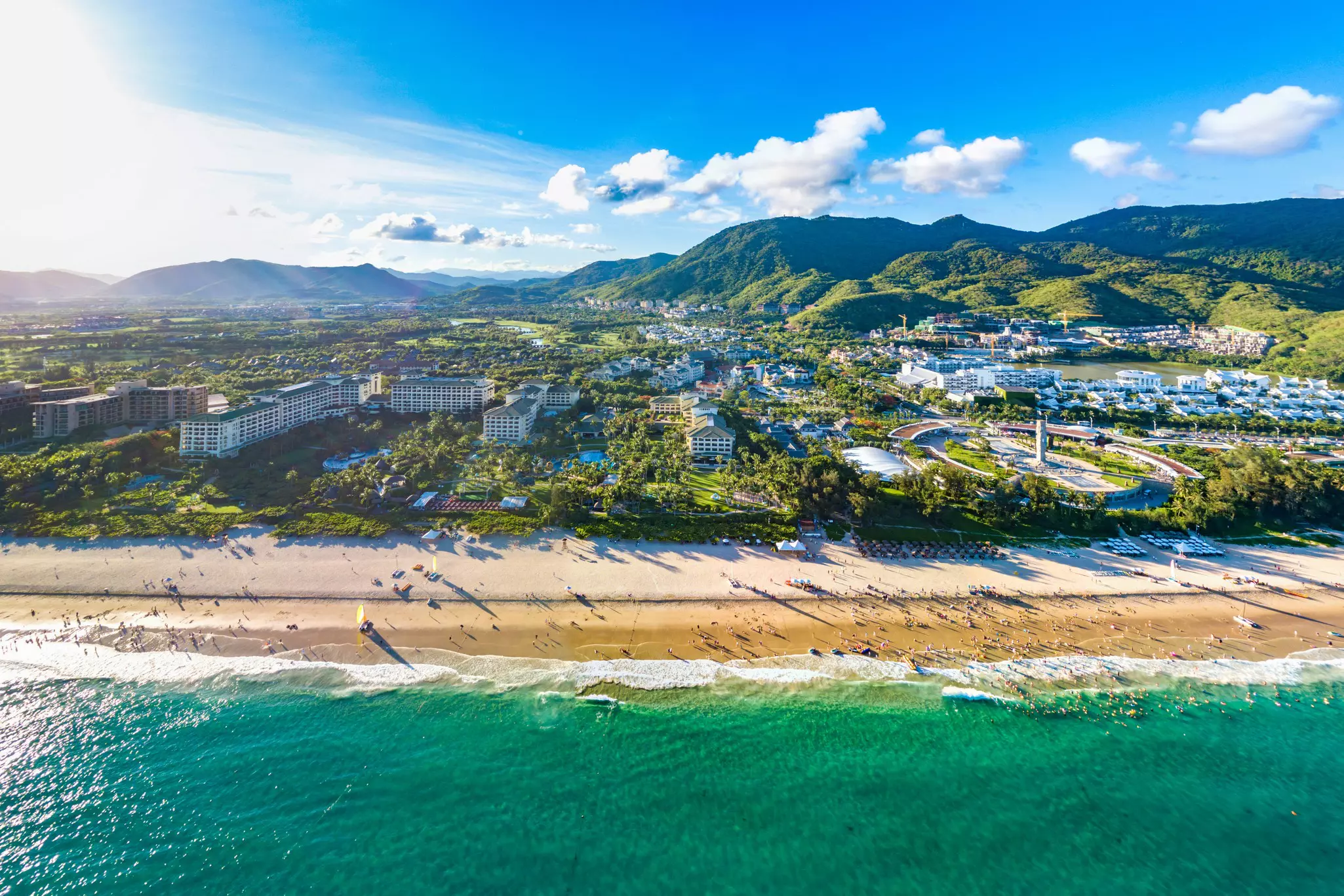 Beach resorts line the shore at Yalong Bay near Sanya, Hainan, China.
