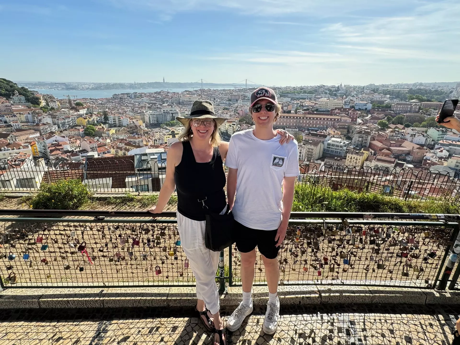 The author and her nephew take in the city from one of Lisbon's top viewpoints, Miradouro da Senhora do Monte © Brekke Fletcher/Lonely Planet