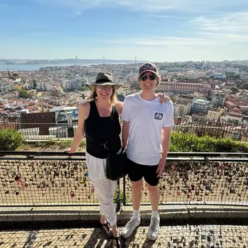 The author and her nephew take in the city from one of Lisbon's top viewpoints, Miradouro da Senhora do Monte © Brekke Fletcher/Lonely Planet