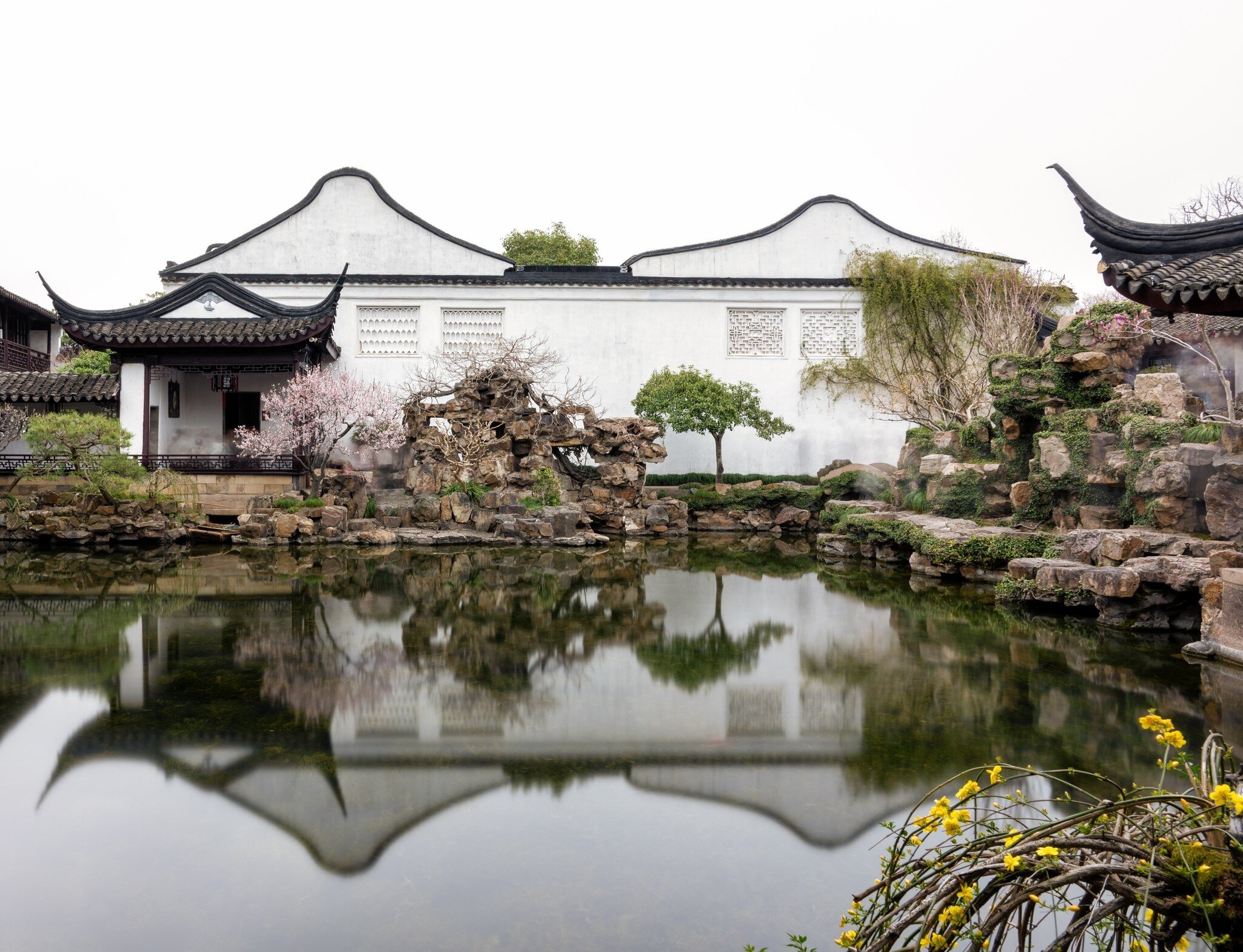 Serene Reflection of Master of Nets Garden in Suzhou, China, License Type: media, Download Time: 2026-09-01T19:13:49.000Z, User: LP_NZhan, Editorial: false, purchase_order: 65050 - Digital Destinations and Articles, job: App Content, client: Lonely Planet App, other: Nadine Zhan