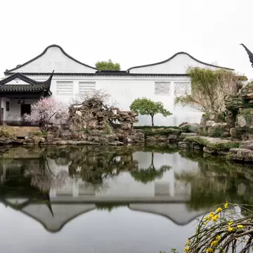 Serene Reflection of Master of Nets Garden in Suzhou, China, License Type: media, Download Time: 2026-09-01T19:13:49.000Z, User: LP_NZhan, Editorial: false, purchase_order: 65050 - Digital Destinations and Articles, job: App Content, client: Lonely Planet App, other: Nadine Zhan