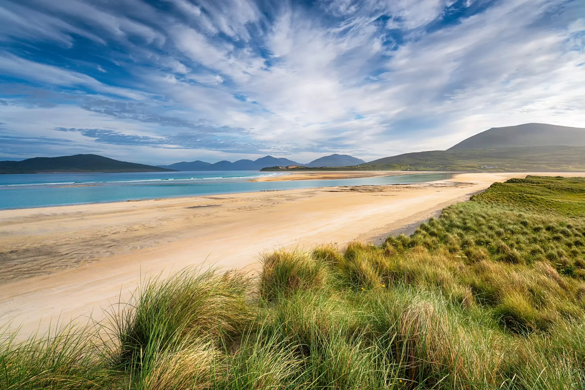 Beautiful beaches and rugged landscapes await in Scotland's Outer Hebrides. Helen Hotson/Shutterstock