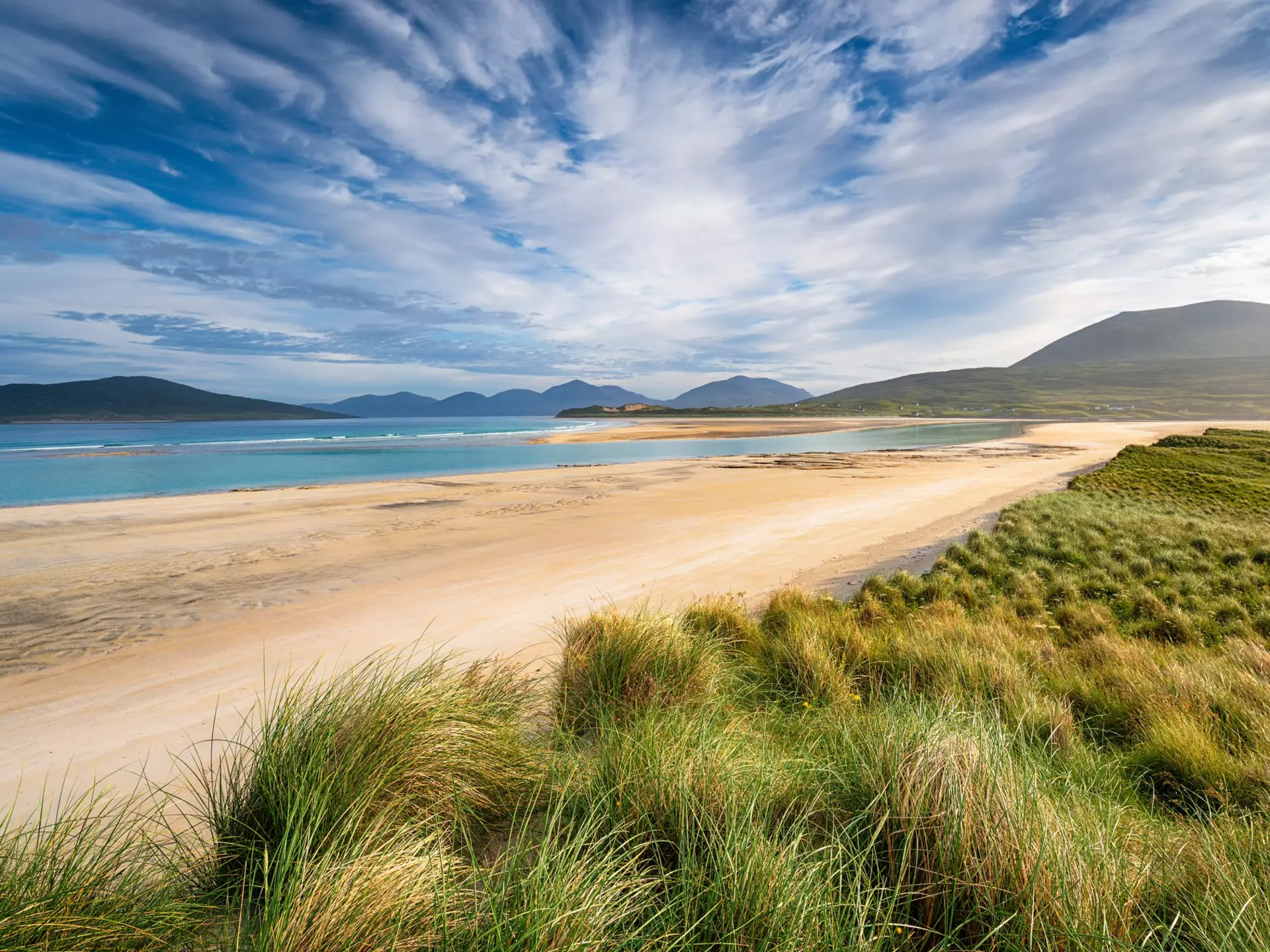 Beautiful beaches and rugged landscapes await in Scotland's Outer Hebrides. Helen Hotson/Shutterstock