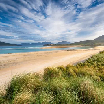 Beautiful beaches and rugged landscapes await in Scotland's Outer Hebrides. Helen Hotson/Shutterstock