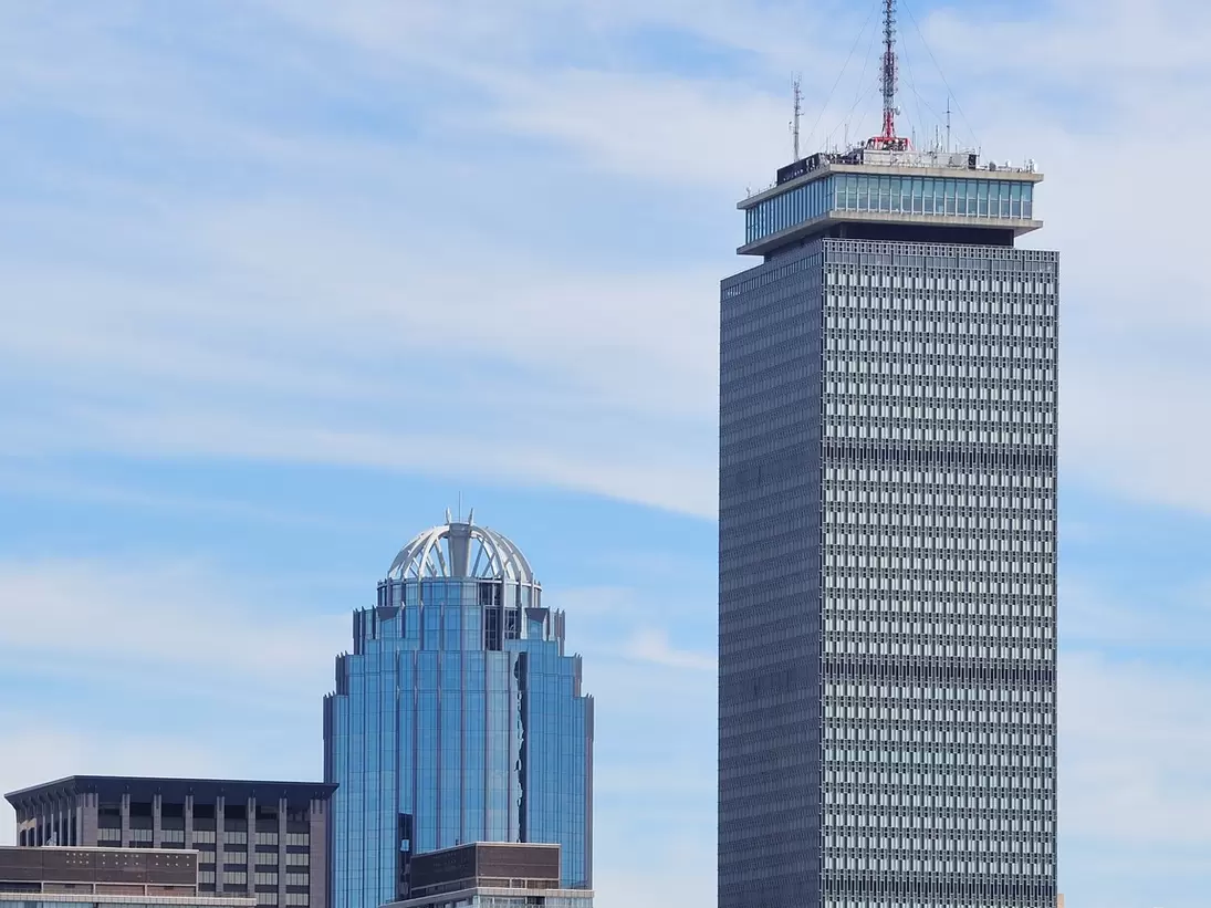 View of the Prudential Center and other skyscrapers over the Charles River in Boston, Massachusetts.