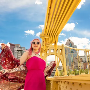 A beautiful 17 year old girl with pink hair enjoying a rare sunny day on the Roberto Clemente Bridge in downtown Pittsburgh, PA, USA.
1156121678