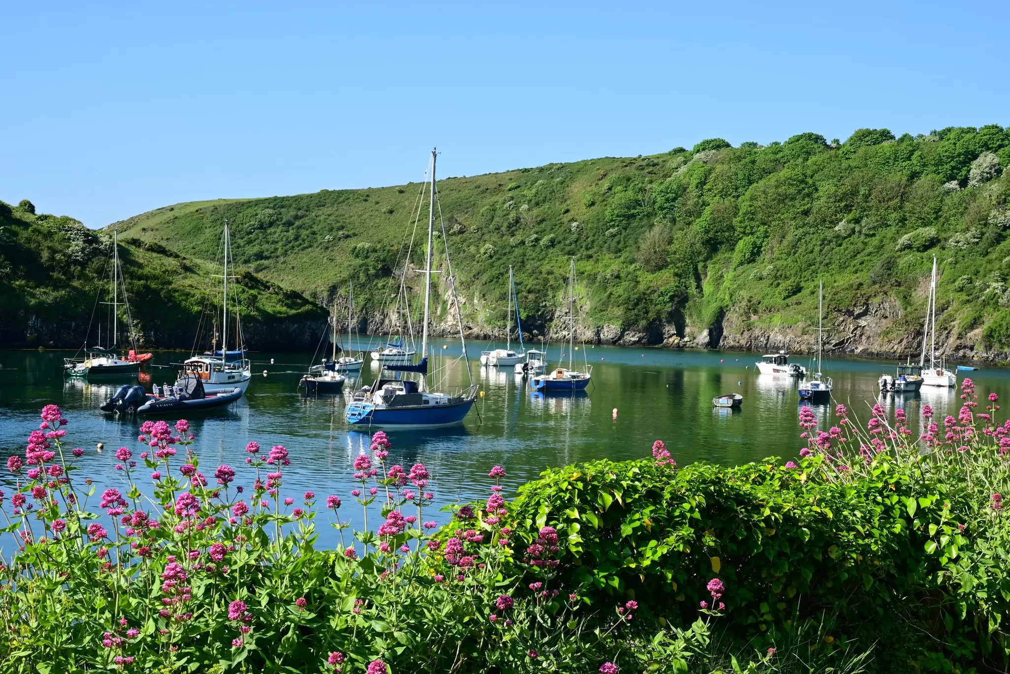 SOLVA, PEMBROKESHIRE, UK - May 15, 2025. The cliff surrounded sheltered harbour at Solva, Pembrokeshire, Wales, UK, License Type: media, Download Time: 2025-12-10T17:43:38.000Z, User: sevelynd12, Editorial: true, purchase_order: 56500 - T&R or Kids, job: Global Publishing WIP, client: Dream Trips of Europe, other: Sharon Dortenzio
