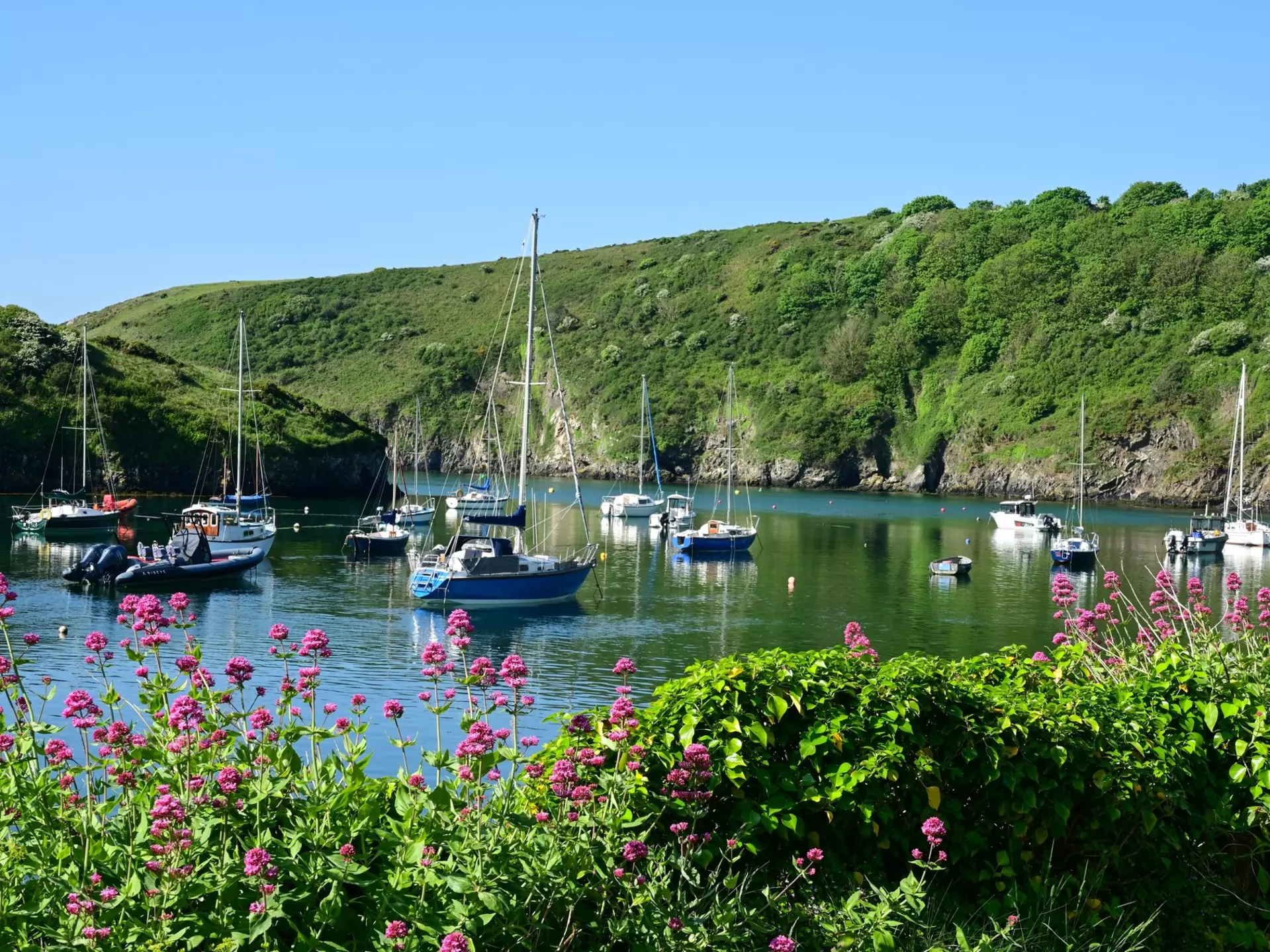 SOLVA, PEMBROKESHIRE, UK - May 15, 2025. The cliff surrounded sheltered harbour at Solva, Pembrokeshire, Wales, UK, License Type: media, Download Time: 2025-12-10T17:43:38.000Z, User: sevelynd12, Editorial: true, purchase_order: 56500 - T&R or Kids, job: Global Publishing WIP, client: Dream Trips of Europe, other: Sharon Dortenzio