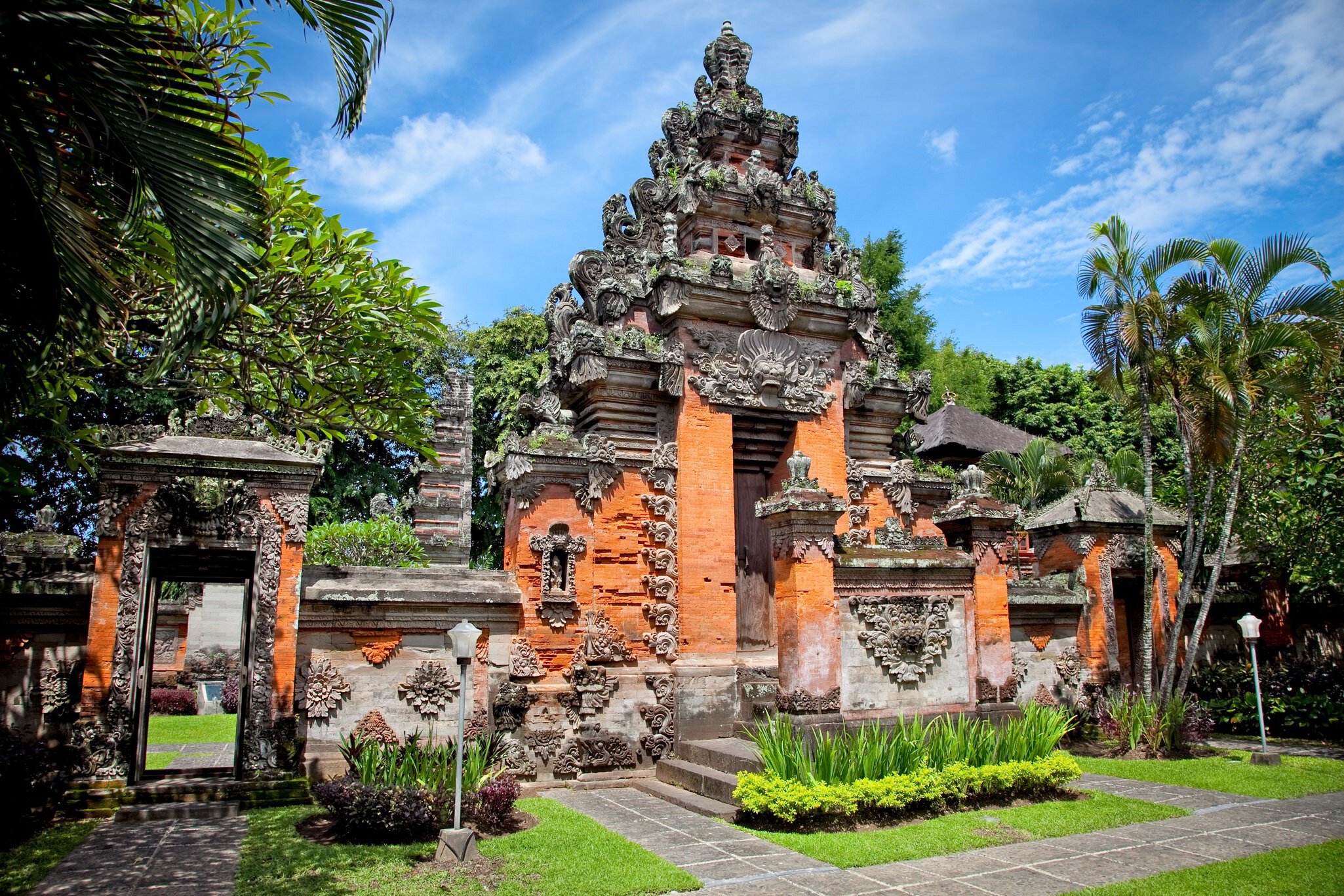 Entrance gate of Negeri Propinsi Museum in Denpasar.
120576172
god, puru, pray, show, asia, pura, bali, holy, offer, stone, tirta, group, candi, sight, hindu, asian, sarong, flower, ritual, sacred, gunung, temple, buddha, siring, museum, outdoor, educate, culture, worship, service, nyegara, shrines, hinduism, denpasar, buddhism, balinese, festival, religion, indonesia, religious, tradition, sanctuary, education, celebration, traditional, sightseeing, spirituality, hindu temple