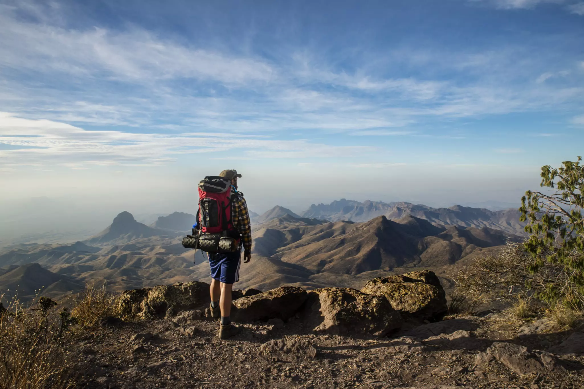 A hiker overlooks the Mexican border in Big Bend National Park, Texas. 