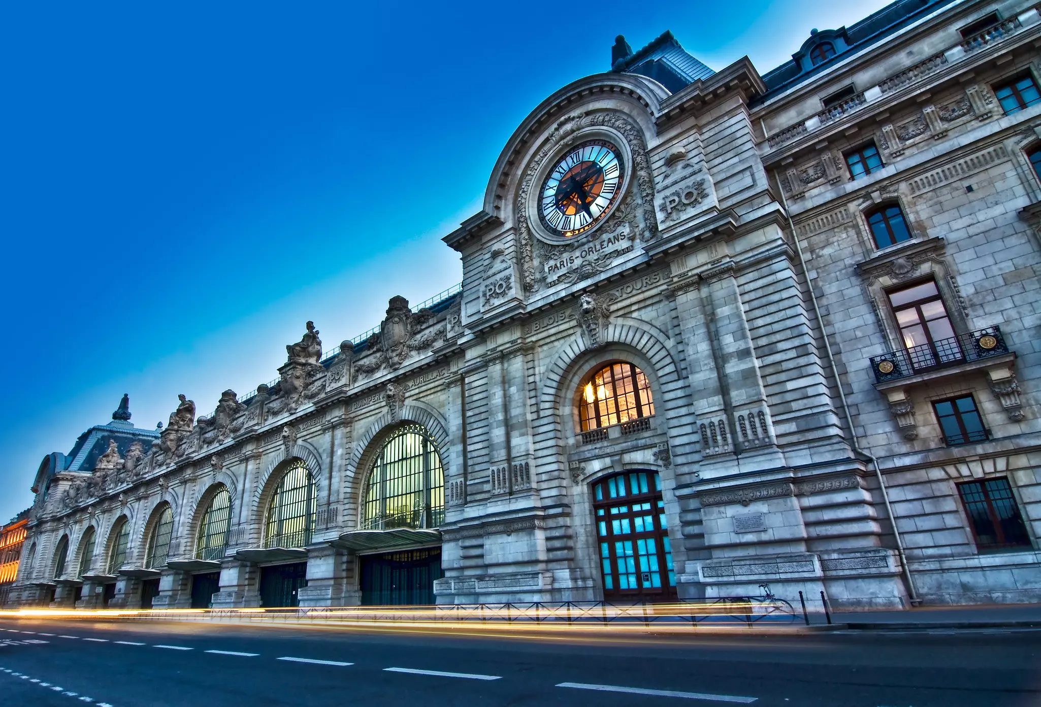 The facade of the Musée d’Orsay at dusk.