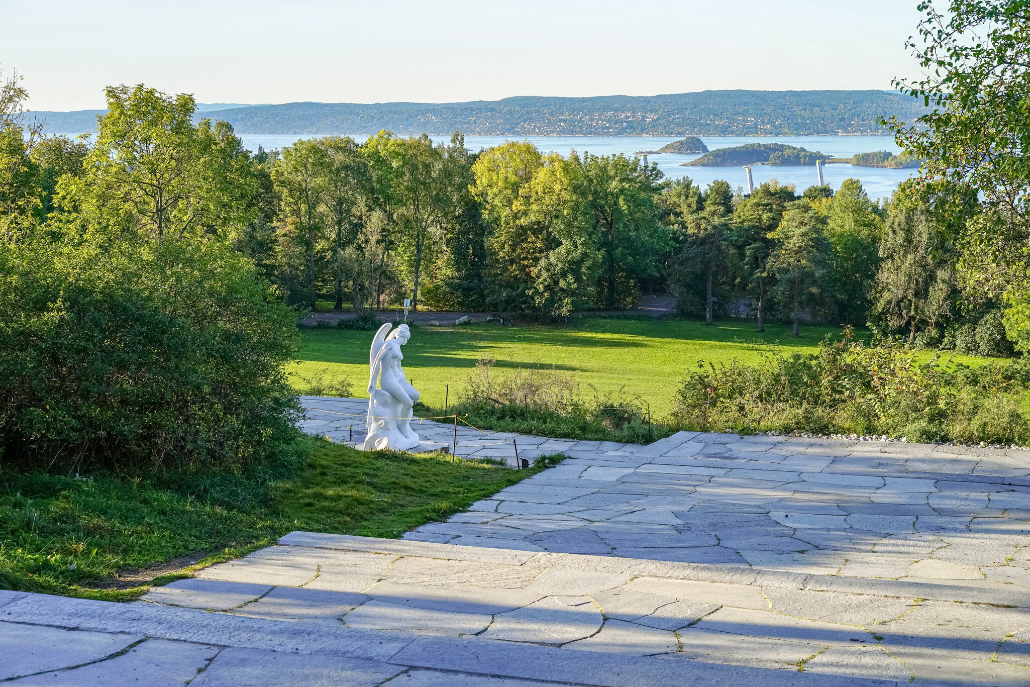 OSLO, NORWAY - OCTOBER 03, 2016: Ekebergparken Sculpture Park with sea view and sculpture "Anatomy of an angel" by the artist Damien Hirst. A sculpture is hewn in Carrara marble.; Shutterstock ID 1499627168;