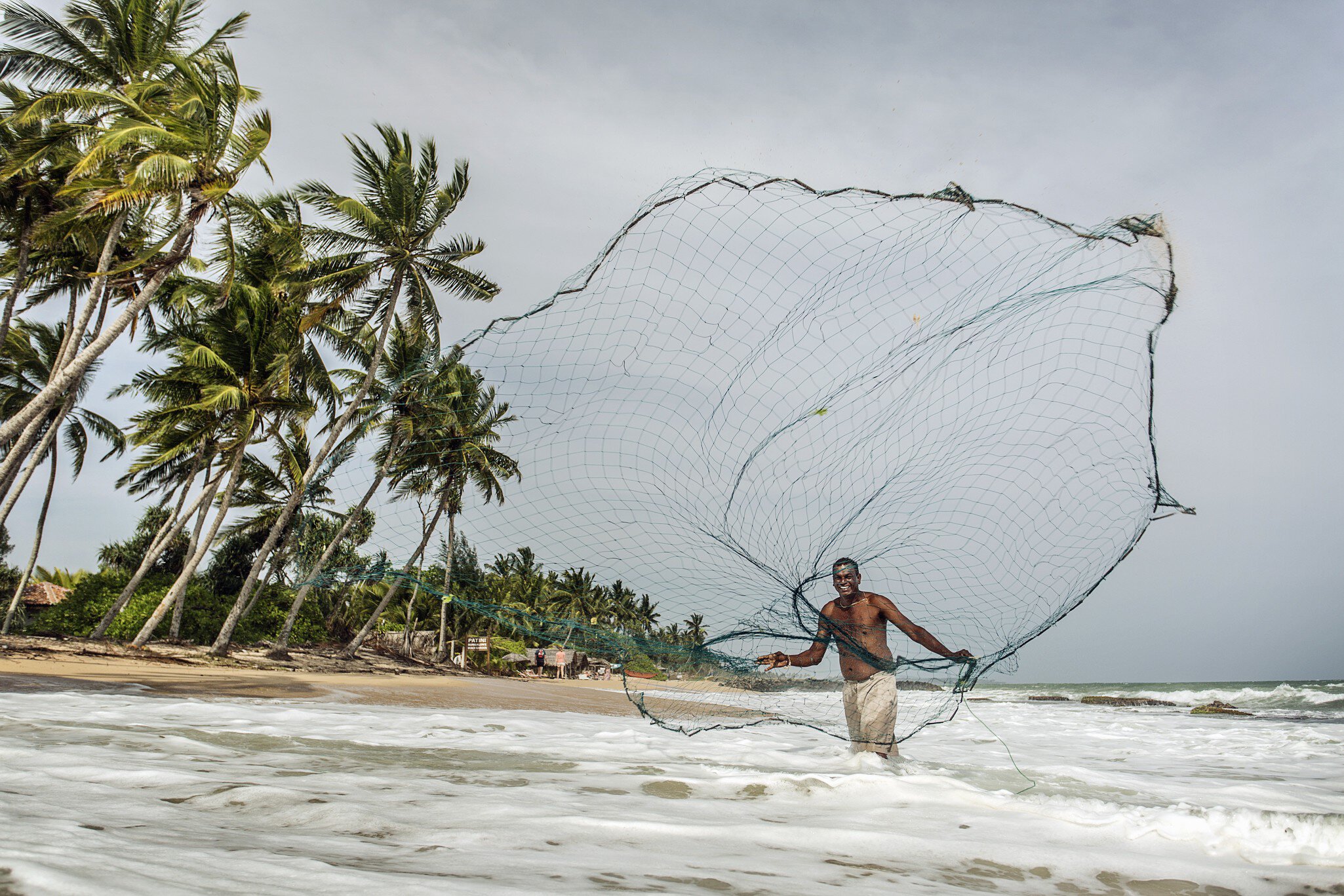 Local fisherman with net