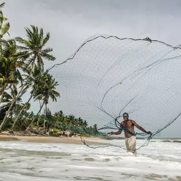 Local fisherman with net