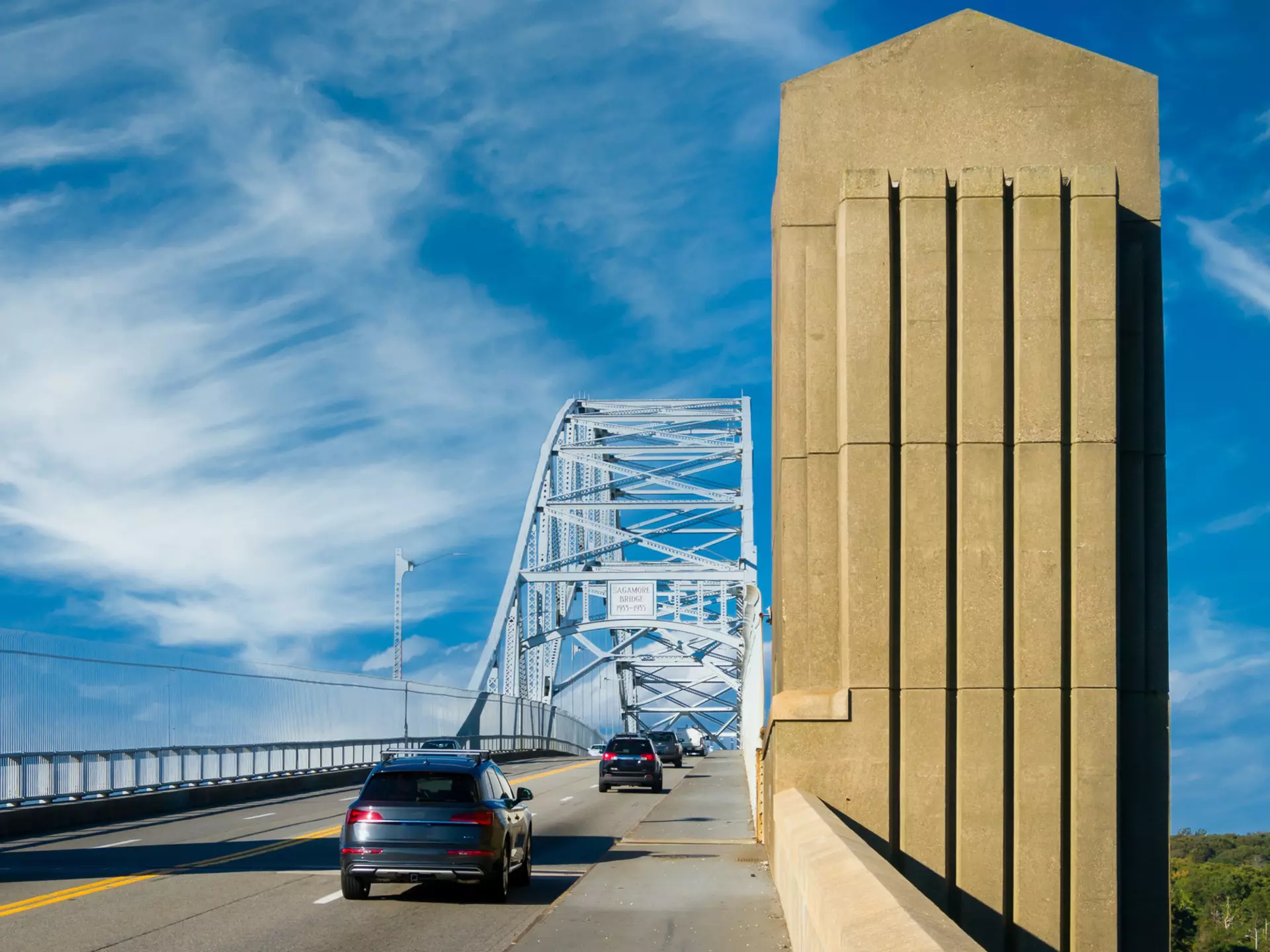 A steady stream of traffic crosses the Sagamore Bridge as it crosses the Cape Cod Canal leaving Cape Cod on a October afternoon.