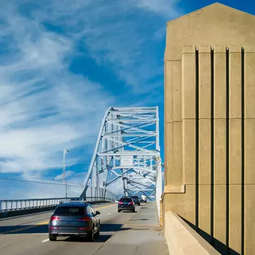 A steady stream of traffic crosses the Sagamore Bridge as it crosses the Cape Cod Canal leaving Cape Cod on a October afternoon.