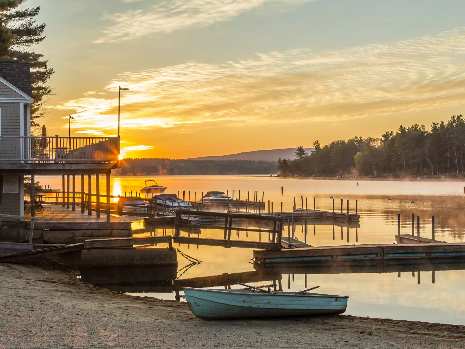 Boats on the shore at sunset at Lake Sunapee, New Hampshire