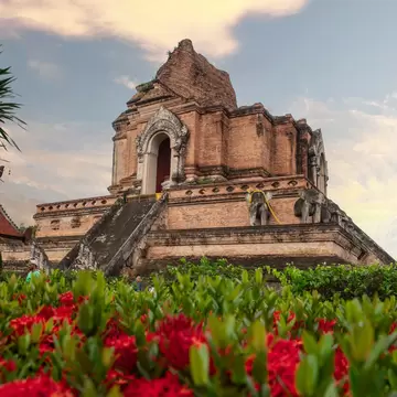 BIT 2025 Chiang Mai, Thailand August 2024. ..Wat Chedi Luang, one of Chiang Mai's most important and historically significant temples, is located in the heart of the Old City. Built in the 14th century, this impressive temple complex once housed the Emerald Buddha, Thailand's most revered religious artifact. The central chedi, or stupa, was originally over 80 meters tall but was partially damaged by an earthquake in the 16th century.