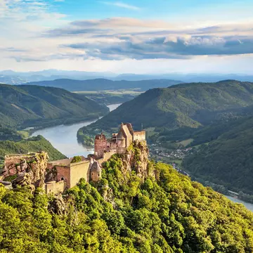 Beautiful landscape with Aggstein castle ruin and Danube river at sunset in Wachau, Austria.
144233116
aggstein, alps, ancient, architecture, austria, austrian, building, castle, countryside, danube, destination, donau, europe, evening, forest, fortification, fortress, green, hill, historic, landmark, landscape, lower austria, medieval, mountain, nature, old, panorama, panoramic, picturesque, river, rocks, rolling hills, romantic, ruin, rural, scenic, sky, stone, sunset, tourism, town, travel, trees, unesco, valley, view, wachau, water, world heritage site