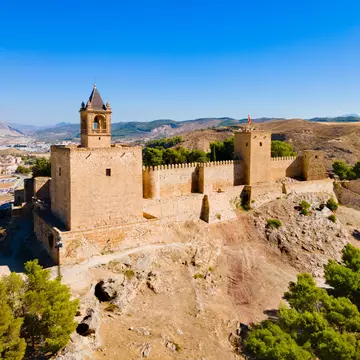 Alcazaba of Antequera aerial panoramic view. The Alcazaba of Antequera is a Moorish fortress in Antequera city in the province of Malaga, the community of Andalusia in Spain.