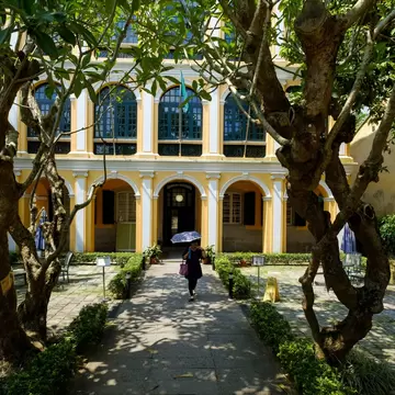 A woman walks out of Sir Robert Ho Tung Library in São Lourenço, Macau, a Special Administrative Region of China September 19, 2017.  , License Type: media, Download Time: 2026-08-26T16:59:34.000Z, User: LP_NZhan, Editorial: true, purchase_order: 65050 - Digital Destinations and Articles, job: App Content, client: Lonely Planet App, other: Nadine Zhan 