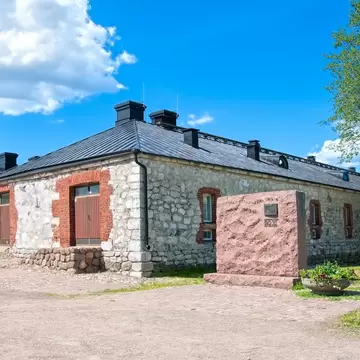 Lappeenranta, Finland - June 15, 2016: Monument for memory of  "Red finns"  shot here in 1918-19 and South Karelia Museum in Lappeenranta Fortress (Villmanstrand). Located in historical part of town.