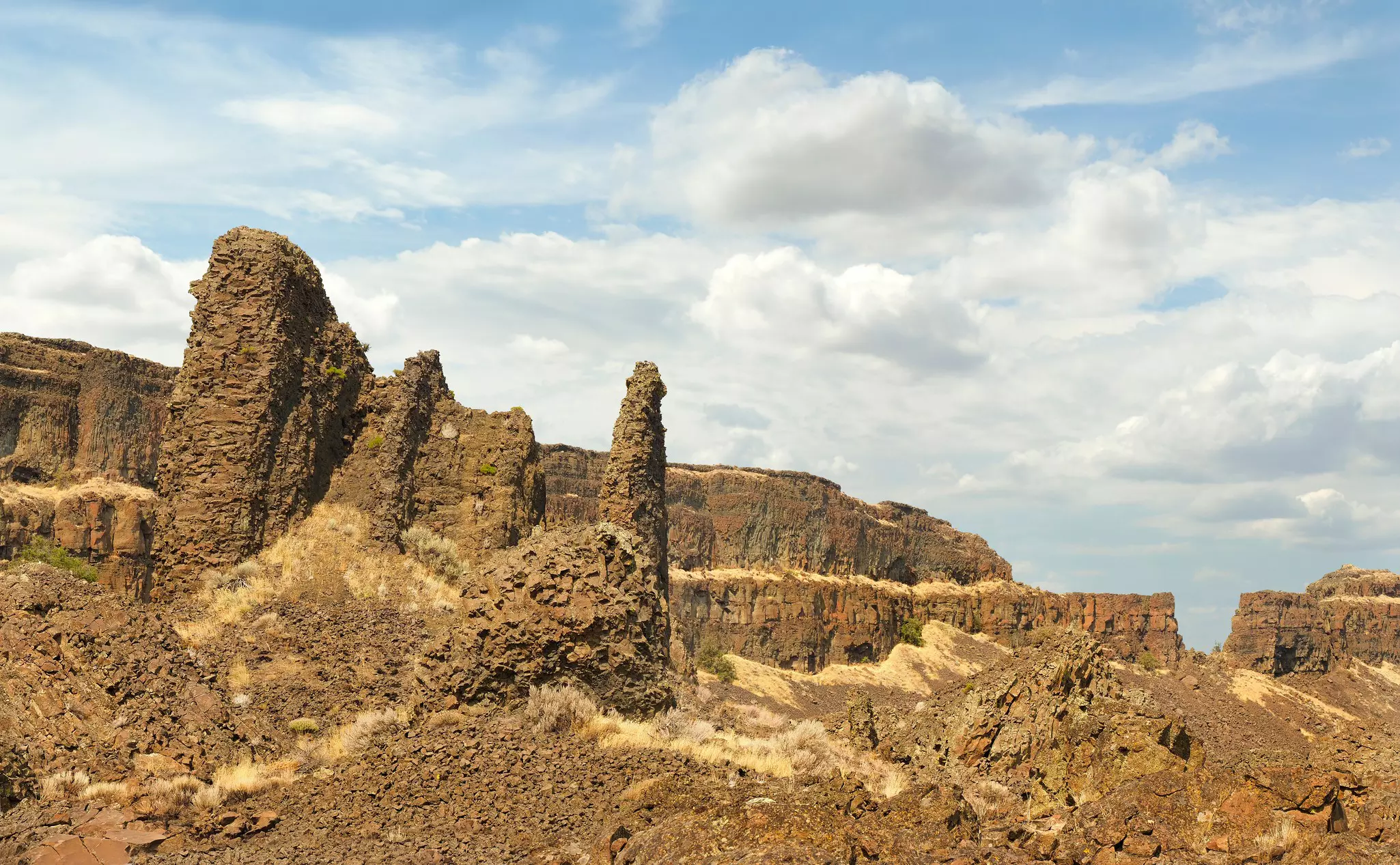 Basalt rock formations on cliffs and in towers in Washington.