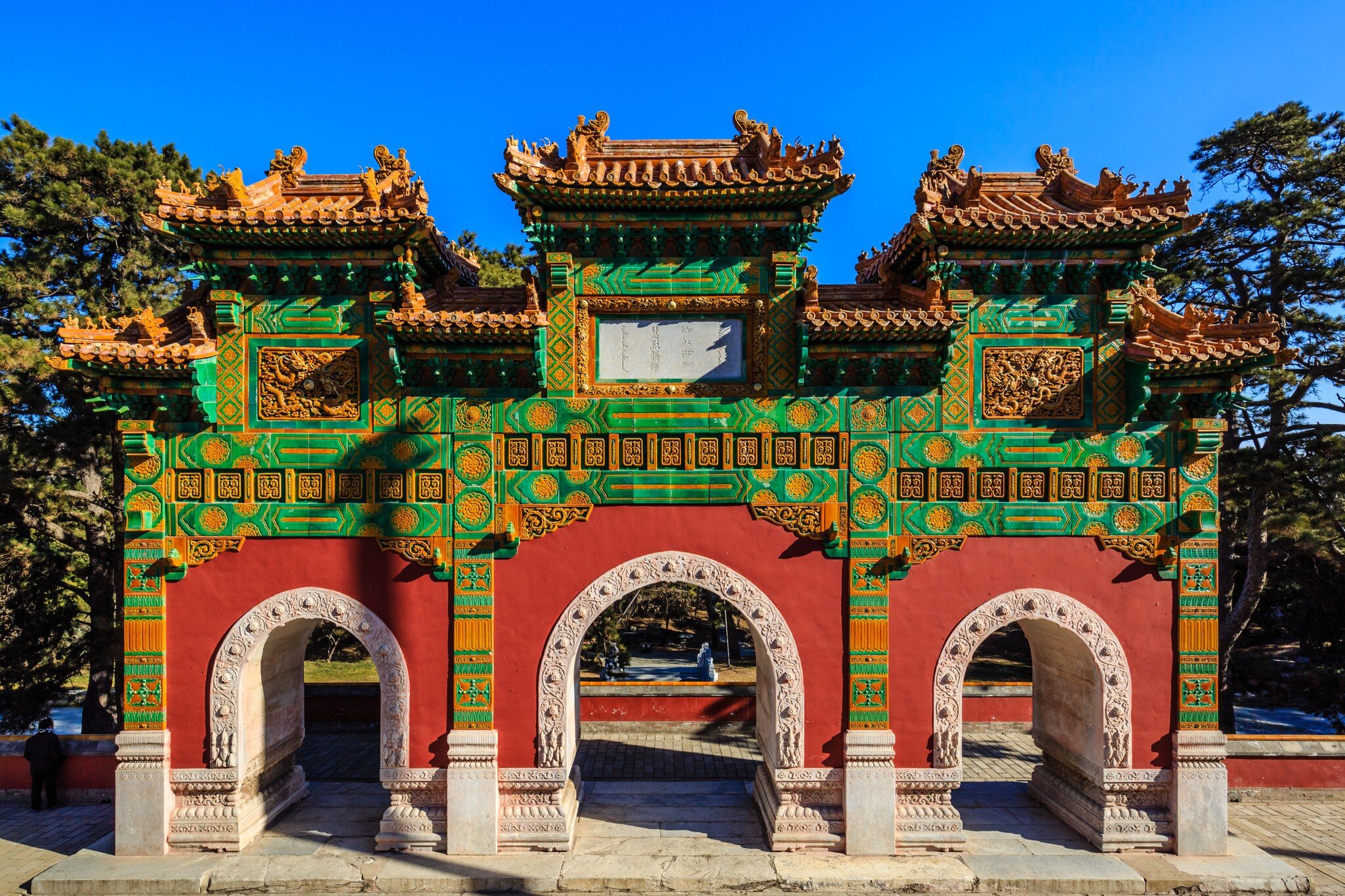Temple of Zhao memorial archway surrounded by trees and blue sky
