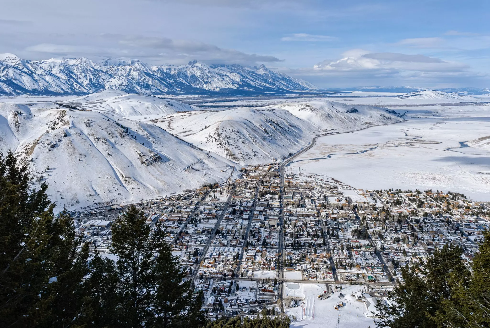 High-angle view of Jackson city covered in snow and the Teton Valley.